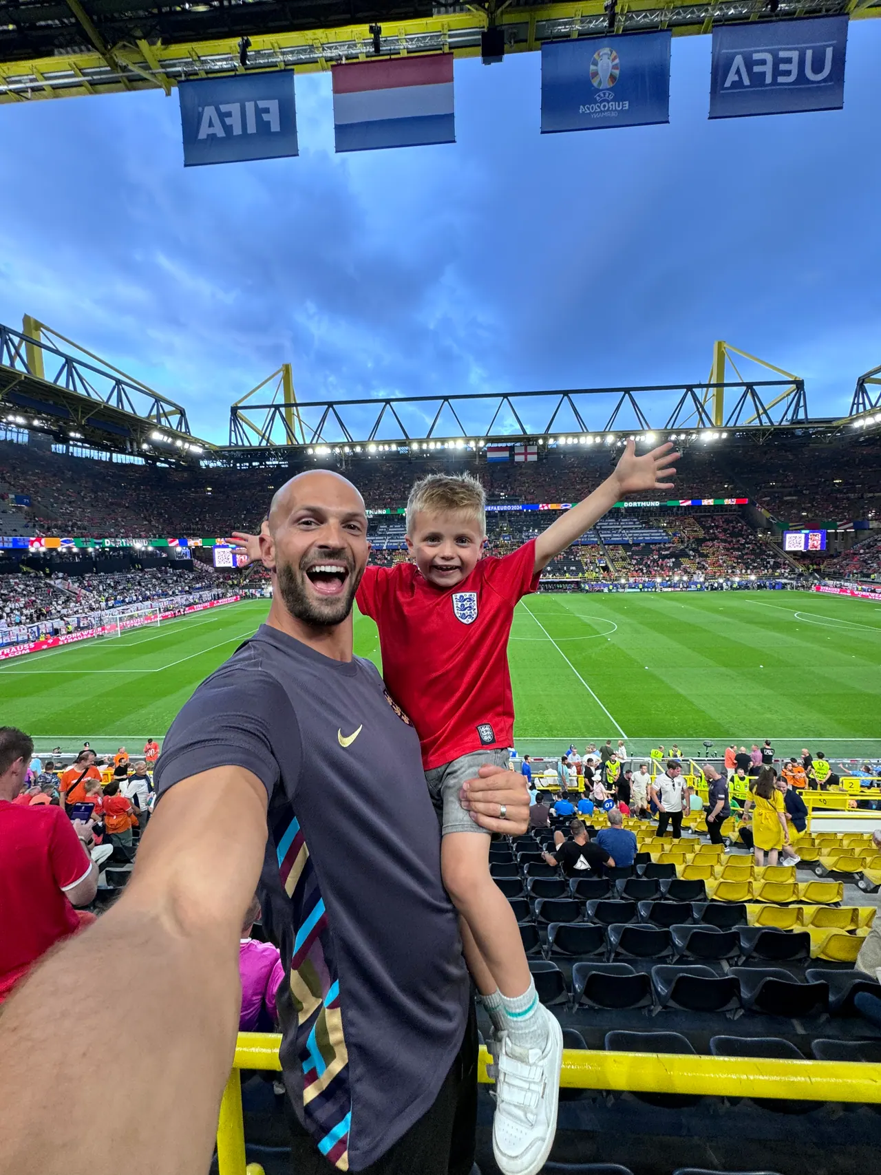 Daniel and Joshua pitchside at a Euros stadium