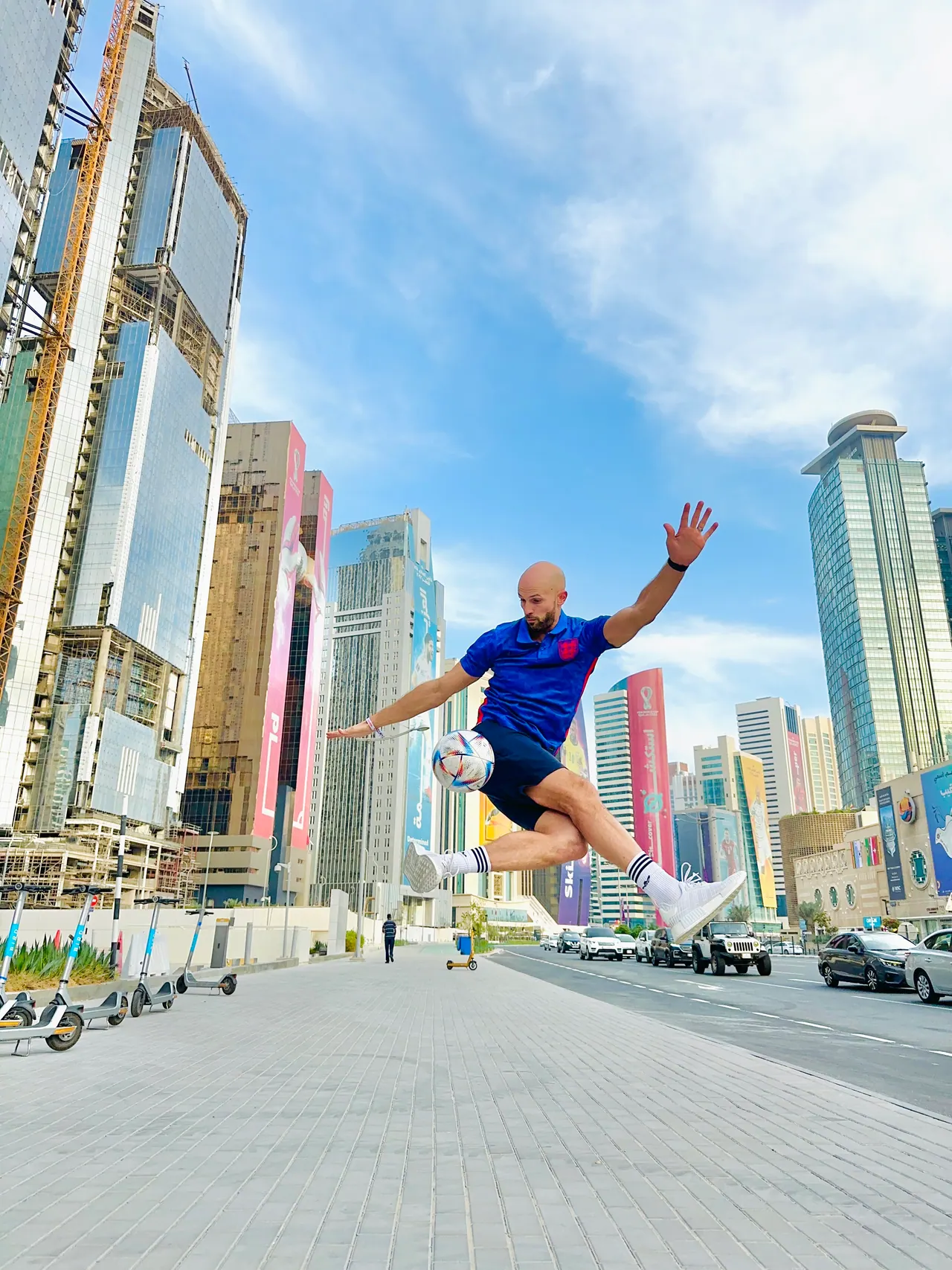 Daniel mid-air with a football in Dubai